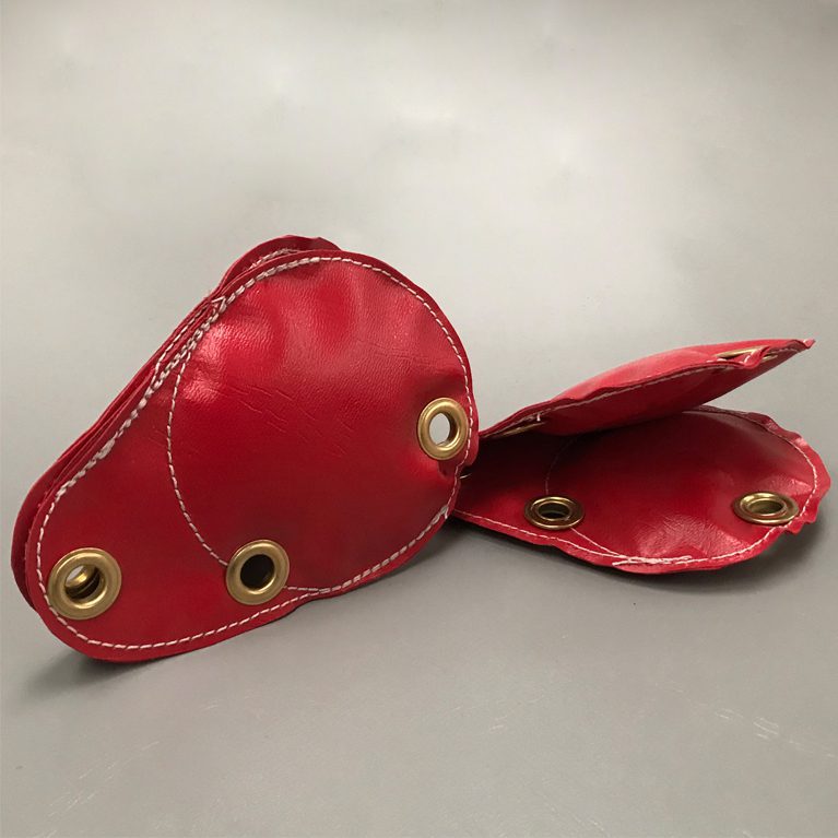 Red shackle covers for indoor softplay areas