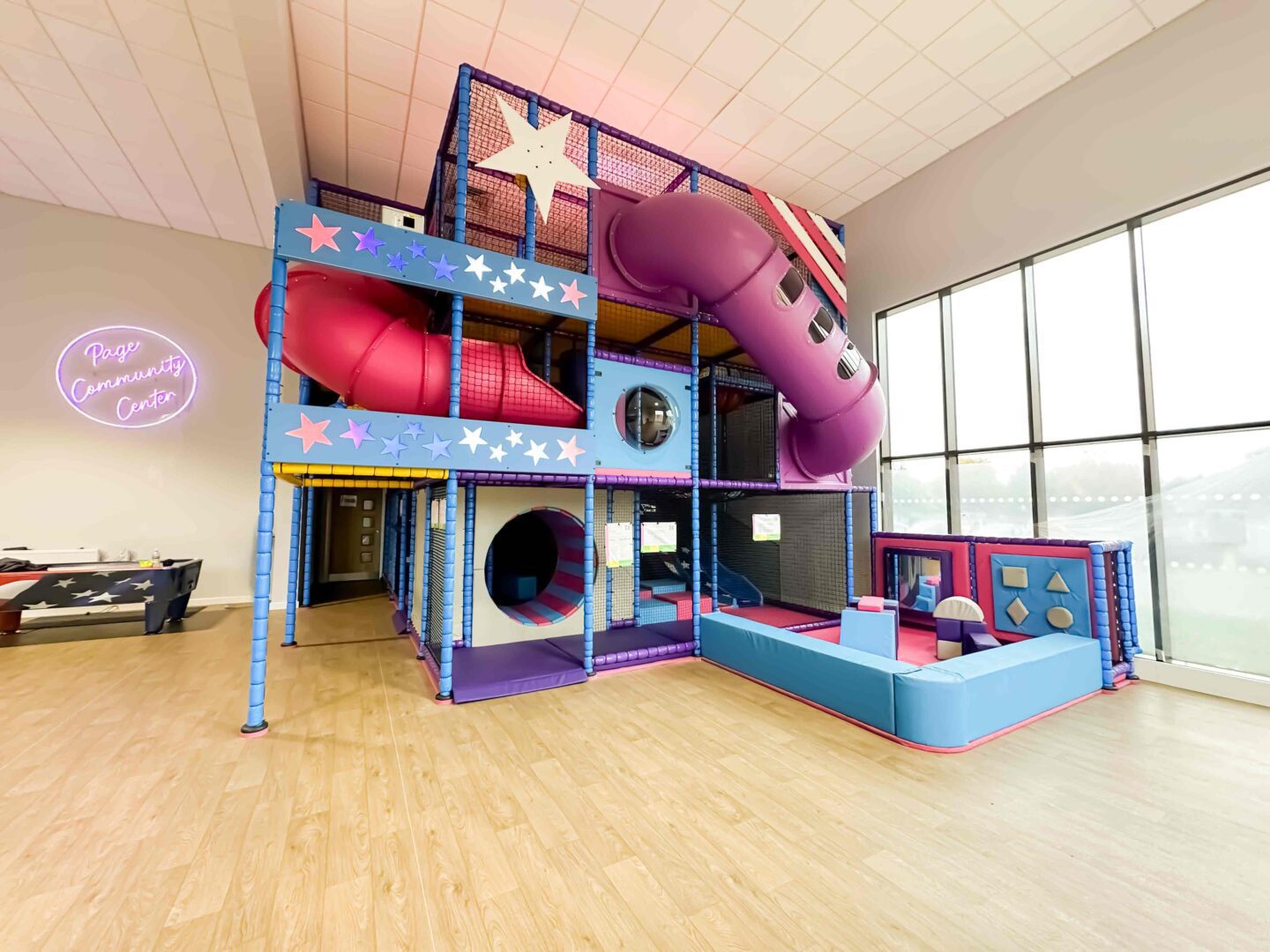 RAF Lakenheath's purple, blue and pink stars and stripes themed indoor softplay area, designed by Play Creations