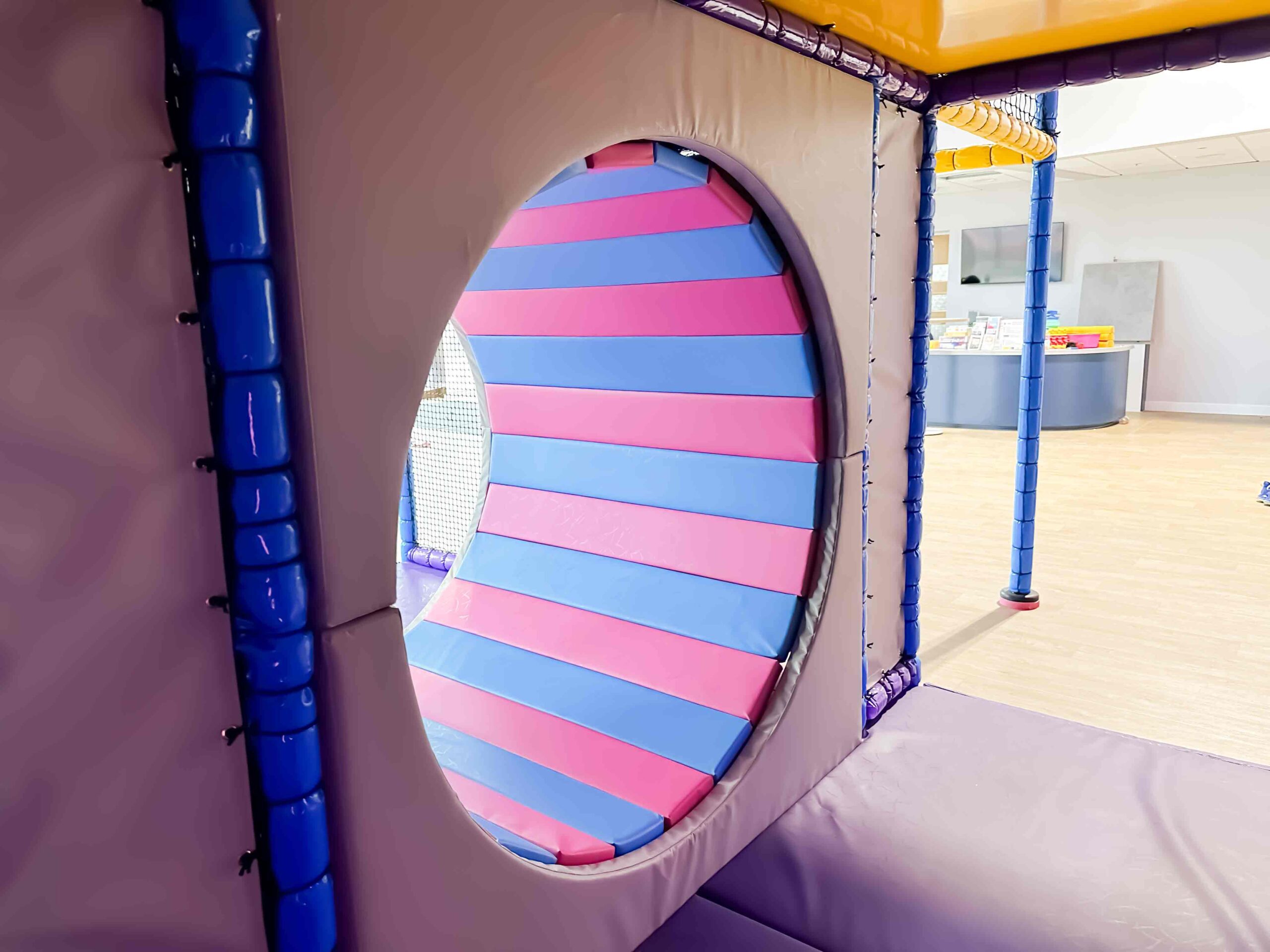 Pink and Blue Vortex Wheel found at RAF Lakenheath's indoor softplay centre, designed by Play Creations.,