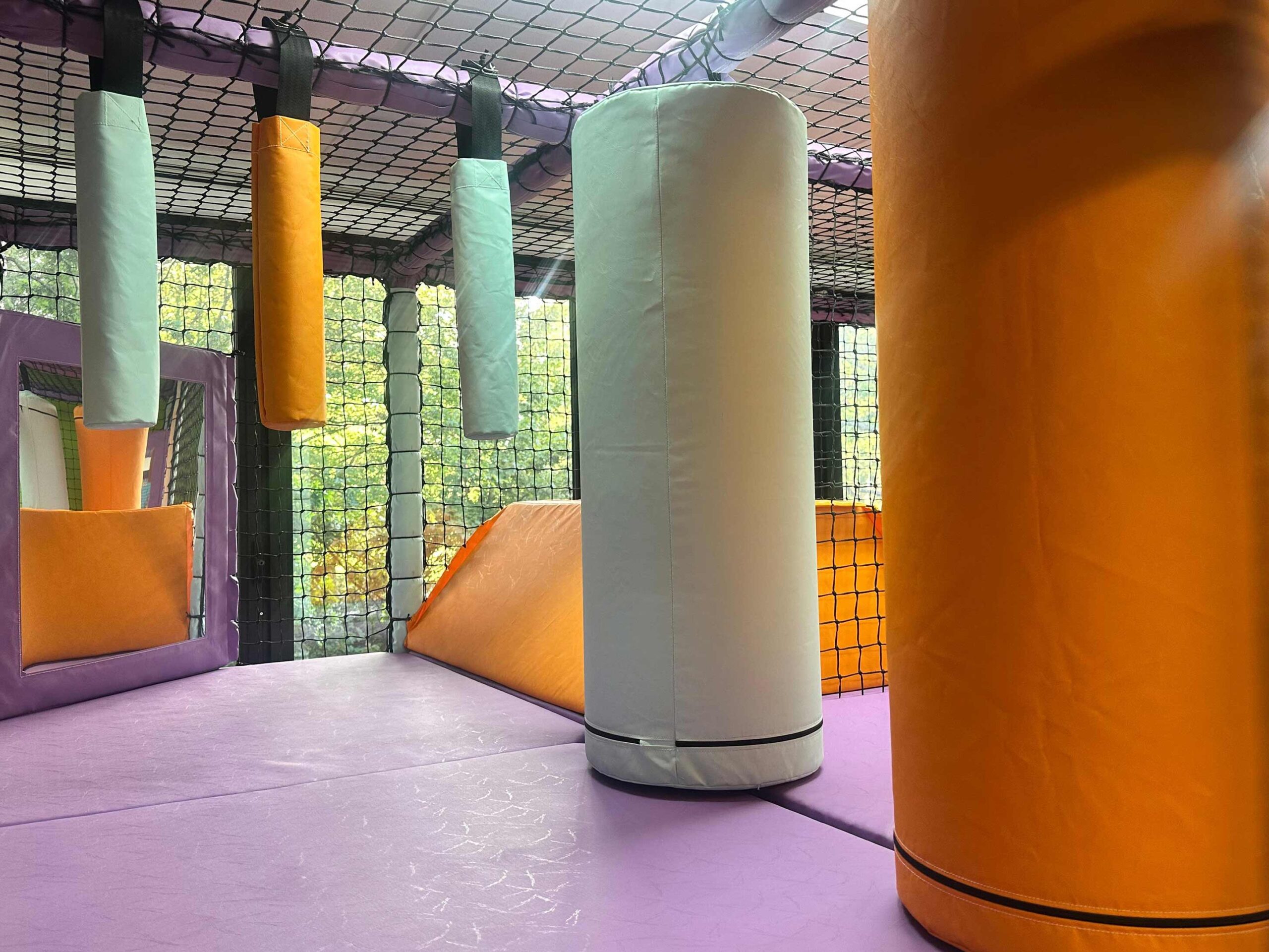 Vertical Rollers and Hanging Snakes at Serenity School's softplay designed by Play Creations