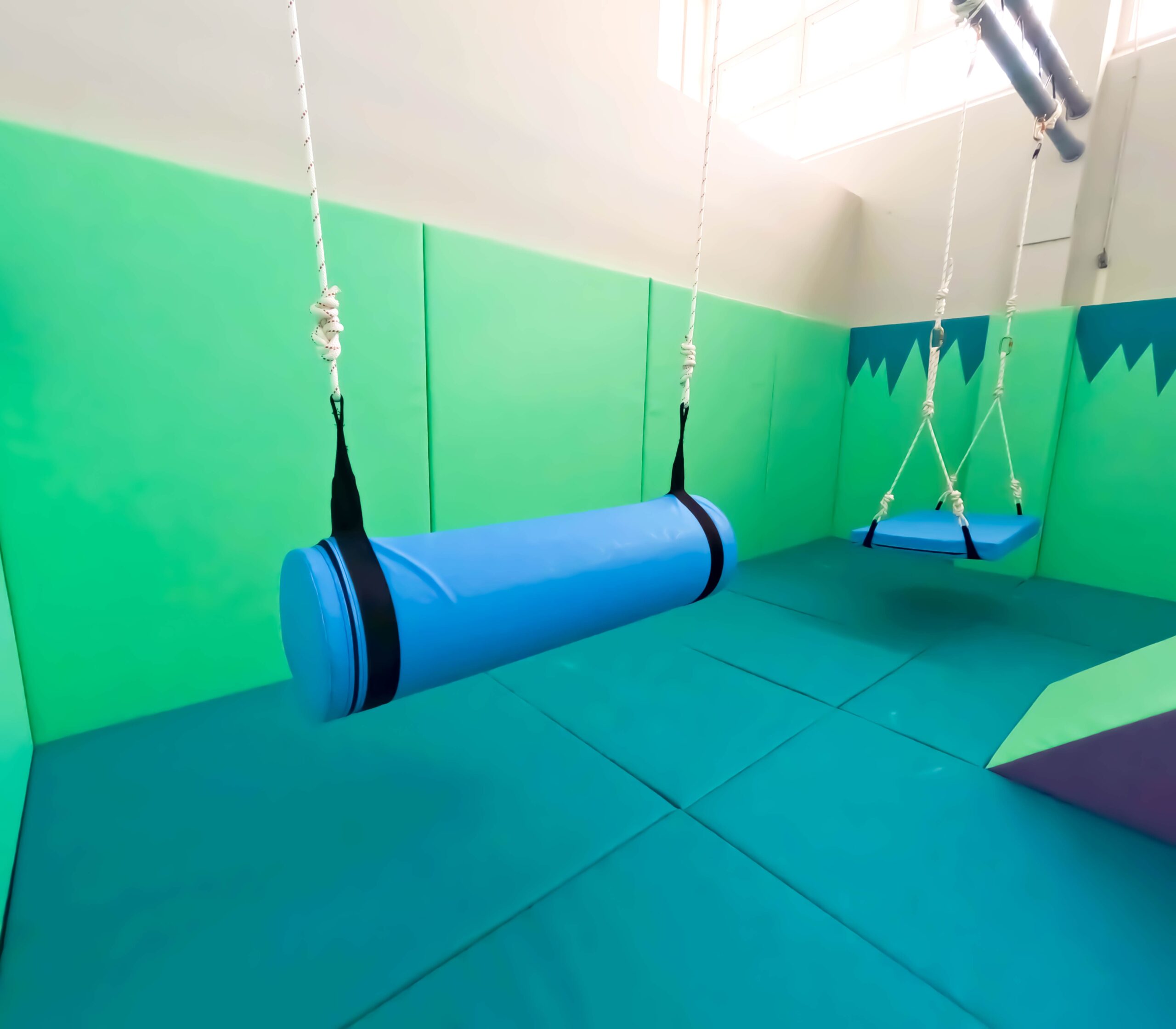 Hanging Sensory Log found at Rushall Primary School's Movement room designed by Play Creations Ltd.