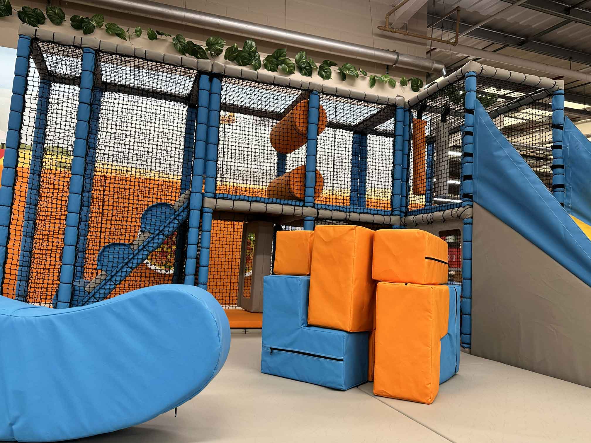 Orange and blue SOMA Cube at Downtown Stores indoor softplay designed by Play Creations