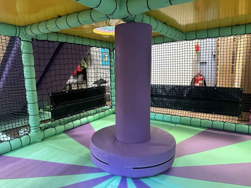 Blue and Purple Dizzy Disc at Temple Park Centre's indoor softplay area, designed by Play Creations